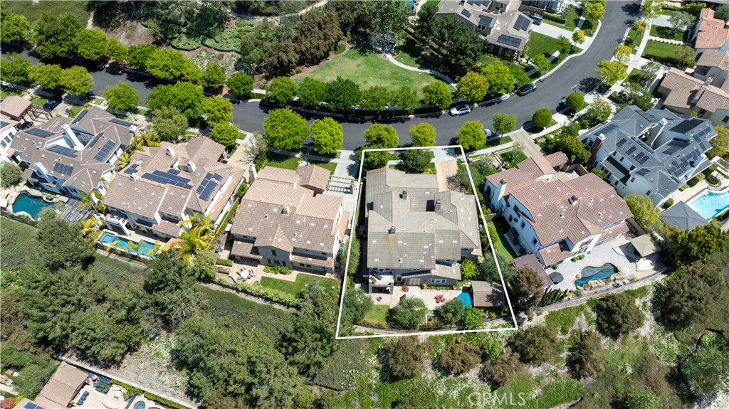 15 Pisano Street Ladera Ranch, CA 92694 - Photo 59 of 73 an aerial view of multiple houses with yard