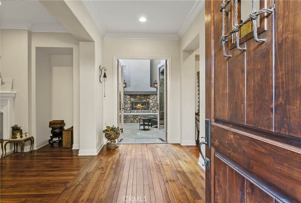 15 Pisano Street Ladera Ranch, CA 92694 - Photo 6 of 73 a view of a hallway view with wooden floor and furniture