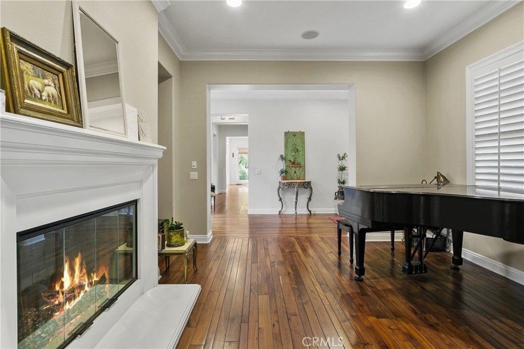 15 Pisano Street Ladera Ranch, CA 92694 - Photo 7 of 73 a view of a livingroom with furniture and a fireplace
