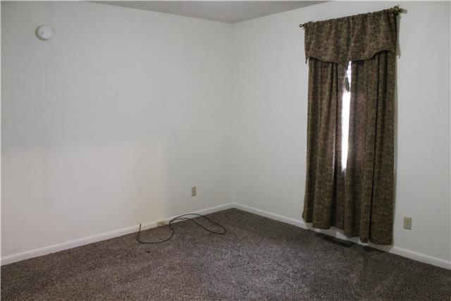 1463 Napier Road Hohenwald, TN 38462 - Photo 7 of 15 BEDROOM WITH NEW CARPET