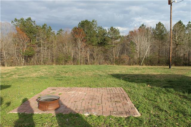 1463 Napier Road Hohenwald, TN 38462 - Photo 10 of 15 BRICK PATIO IN THE BACK YARD, GREAT FOR SITTING AND ENJOYING THE QUIET TIME AND SUNSHINE