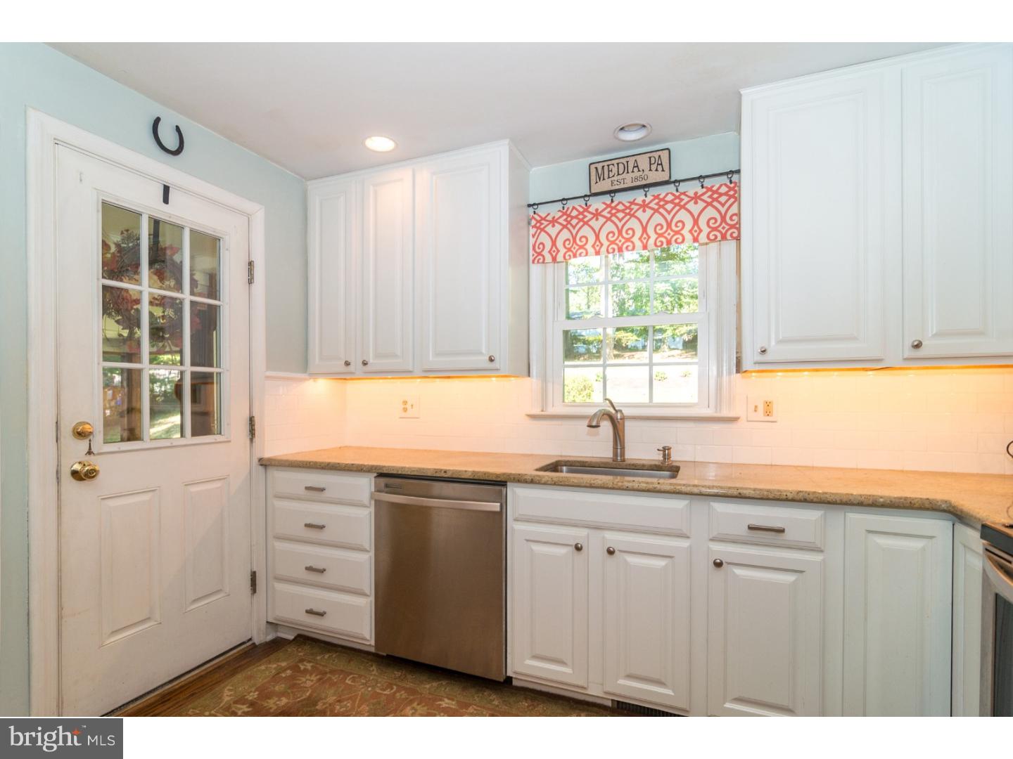 1901 Kimberwick Road Media, PA 19063 - Photo 9 of 25 a kitchen with cabinets appliances and a window
