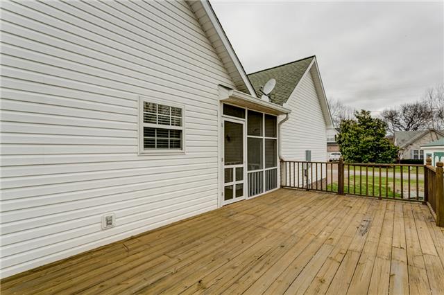 2027 Spring Meadow Circle Spring Hill, TN 37174 - Photo 19 of 20 The outdoor deck allows your enjoy a private morning setting to contemplate the coming day .