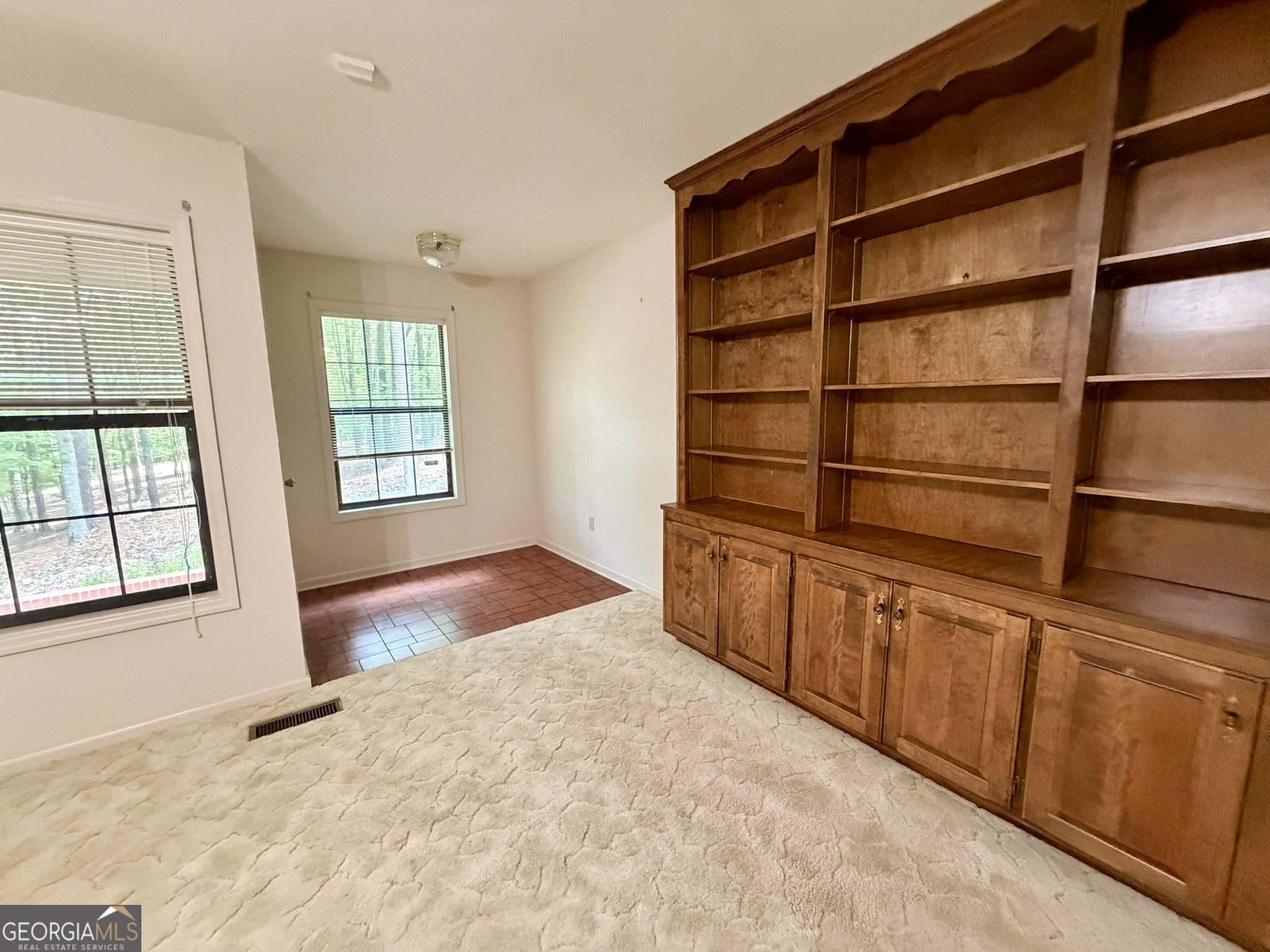 213 Stembridge Road Southeast Milledgeville, GA 31061 - Photo 11 of 83 a view of an empty room with a window