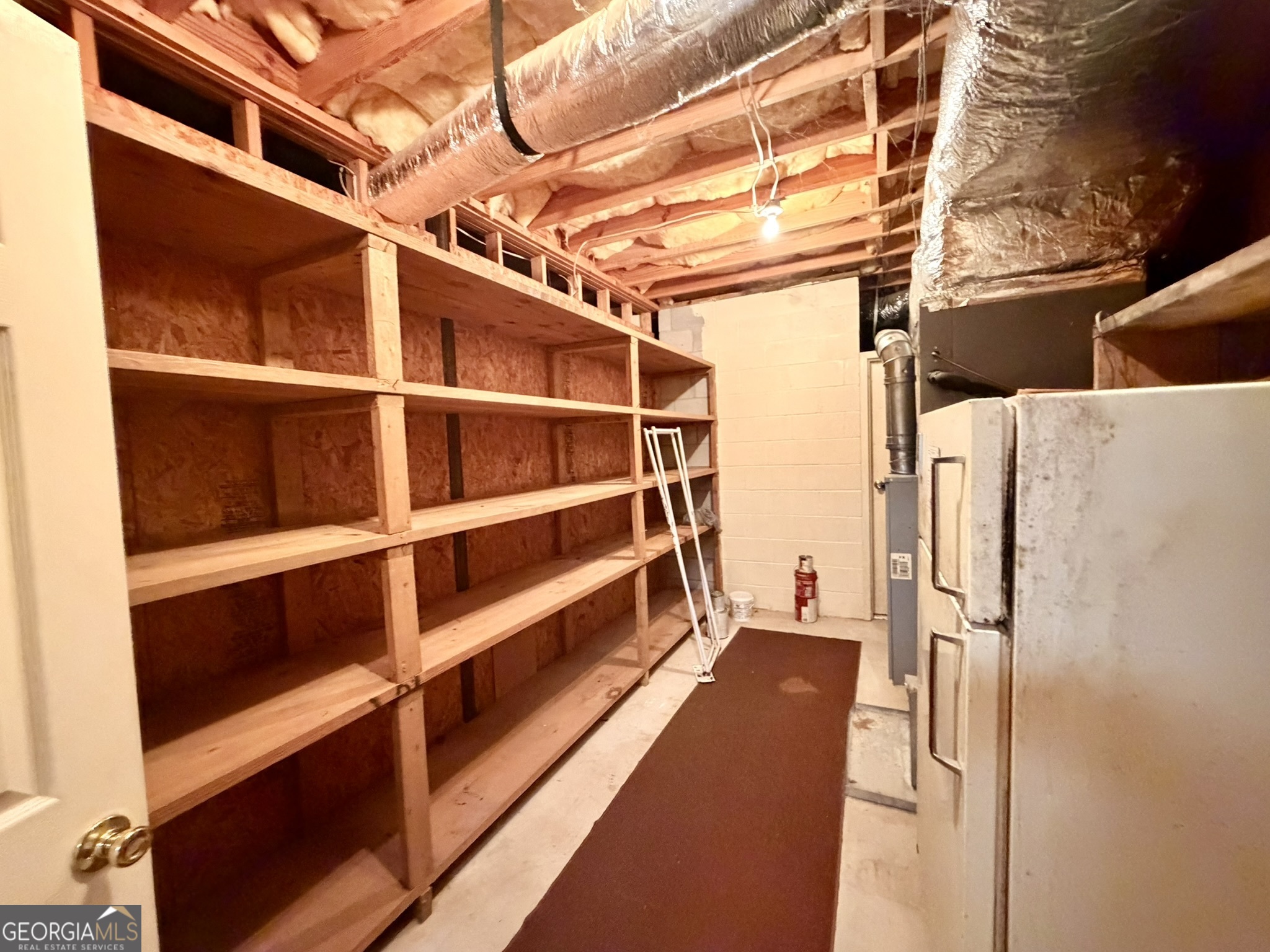 213 Stembridge Road Southeast Milledgeville, GA 31061 - Photo 19 of 83 a view of walk in closet with empty racks