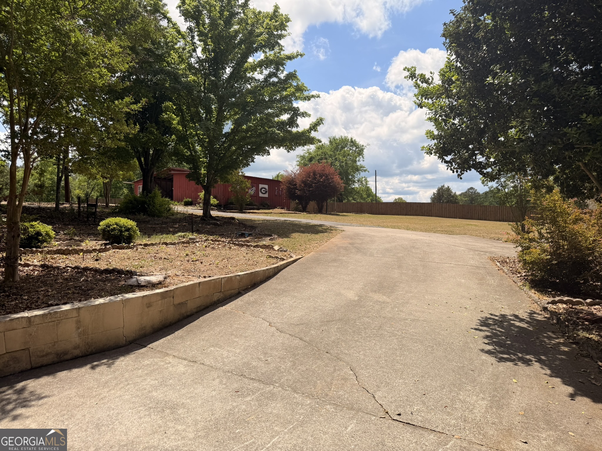213 Stembridge Road Southeast Milledgeville, GA 31061 - Photo 22 of 83 a view of a yard with plants and trees