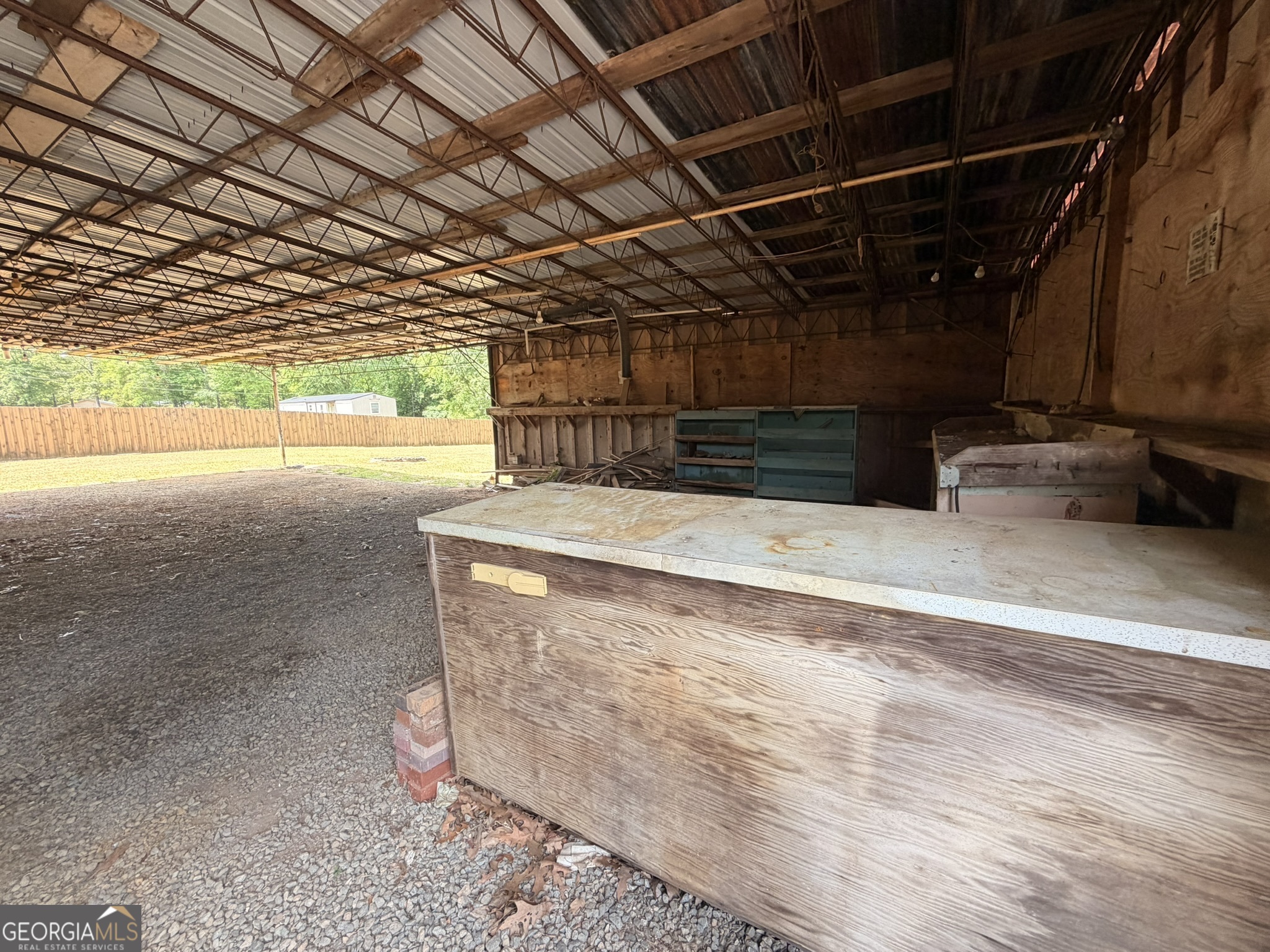 213 Stembridge Road Southeast Milledgeville, GA 31061 - Photo 23 of 83 a view of a room with racks on the wall