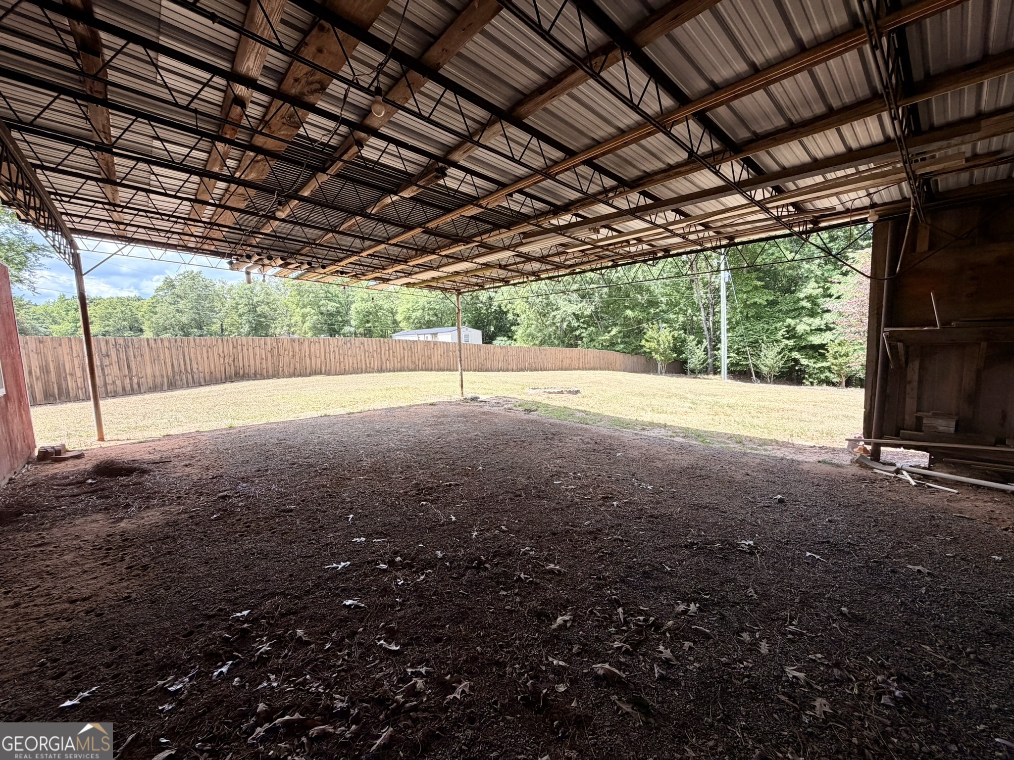 213 Stembridge Road Southeast Milledgeville, GA 31061 - Photo 26 of 83 a view of a room with wooden walls