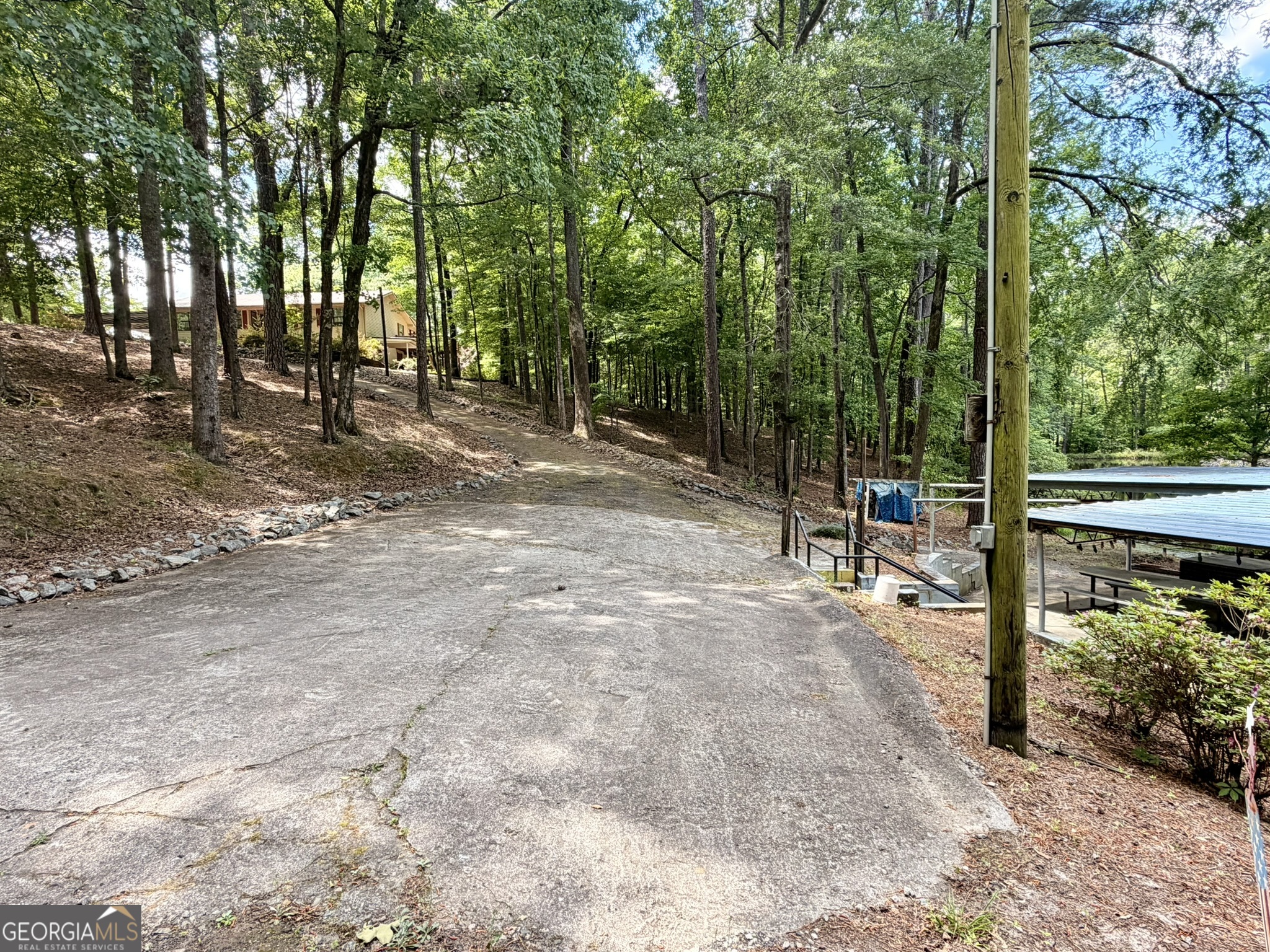 213 Stembridge Road Southeast Milledgeville, GA 31061 - Photo 36 of 83 a view of outdoor space with deck and trees
