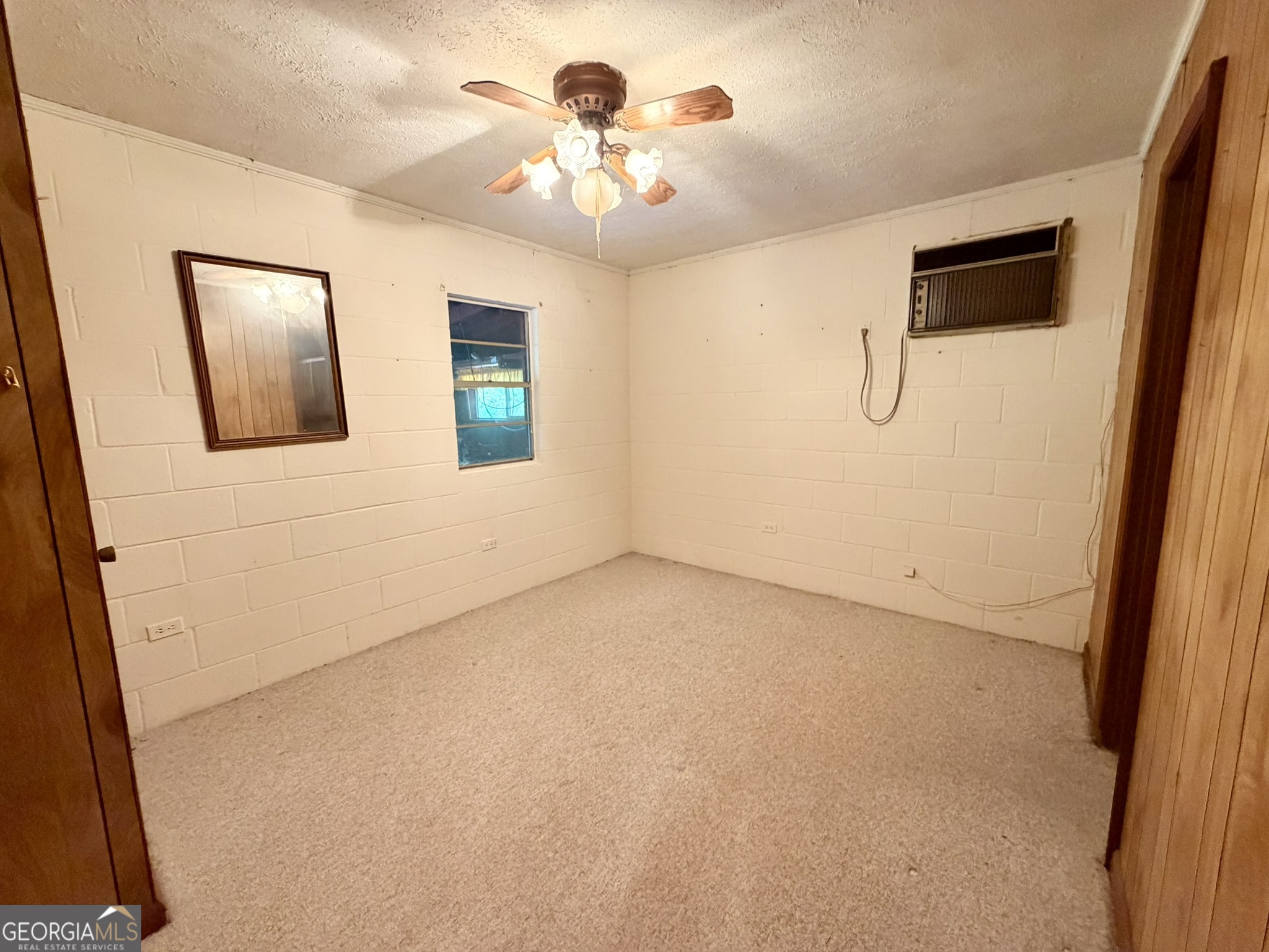 213 Stembridge Road Southeast Milledgeville, GA 31061 - Photo 46 of 83 a view of an empty room with a window