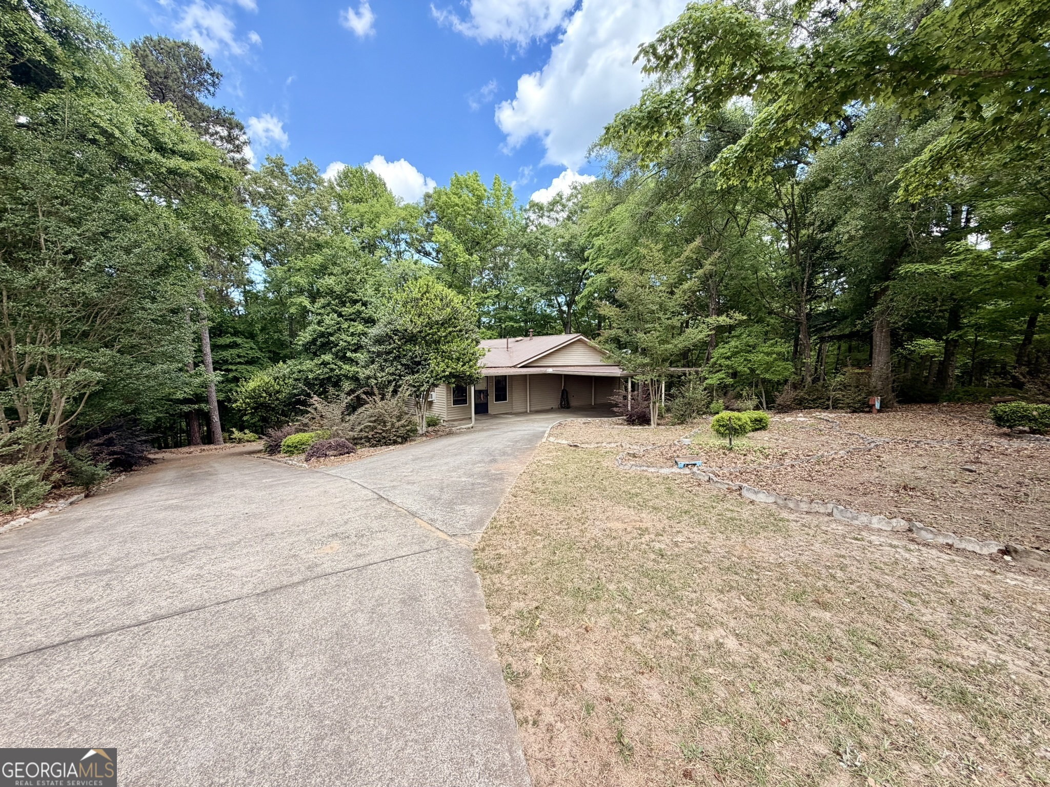 213 Stembridge Road Southeast Milledgeville, GA 31061 - Photo 62 of 83 a dirt road with trees in front of it