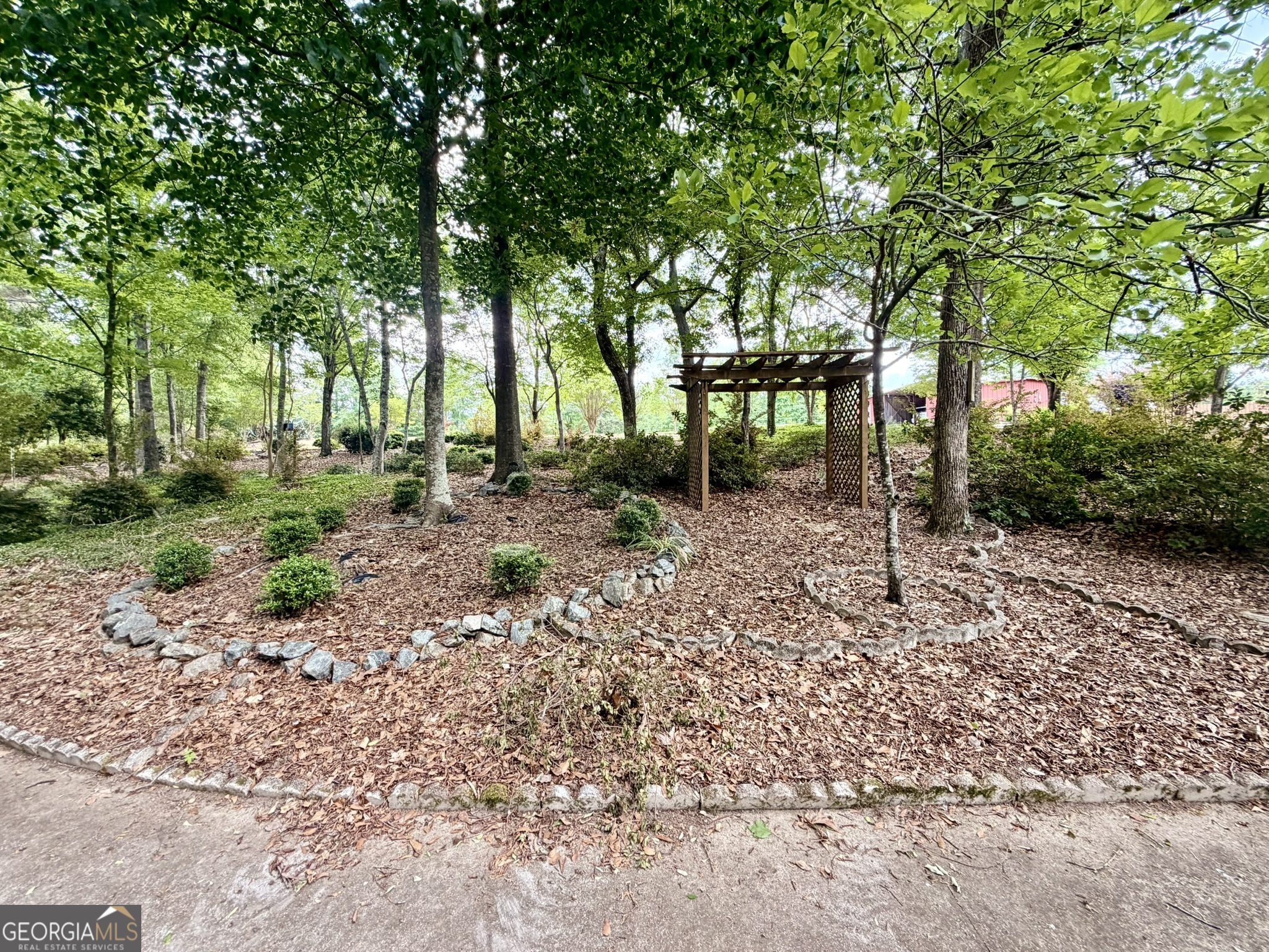 213 Stembridge Road Southeast Milledgeville, GA 31061 - Photo 76 of 83 a backyard of a house with lots of green space