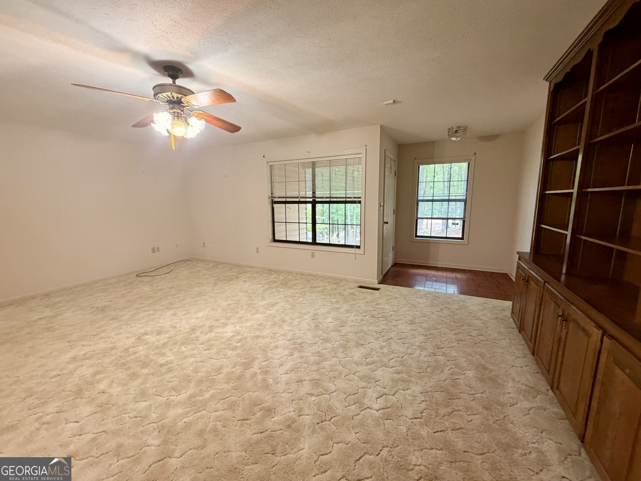 213 Stembridge Road Southeast Milledgeville, GA 31061 - Photo 10 of 83 a view of an empty room with a window