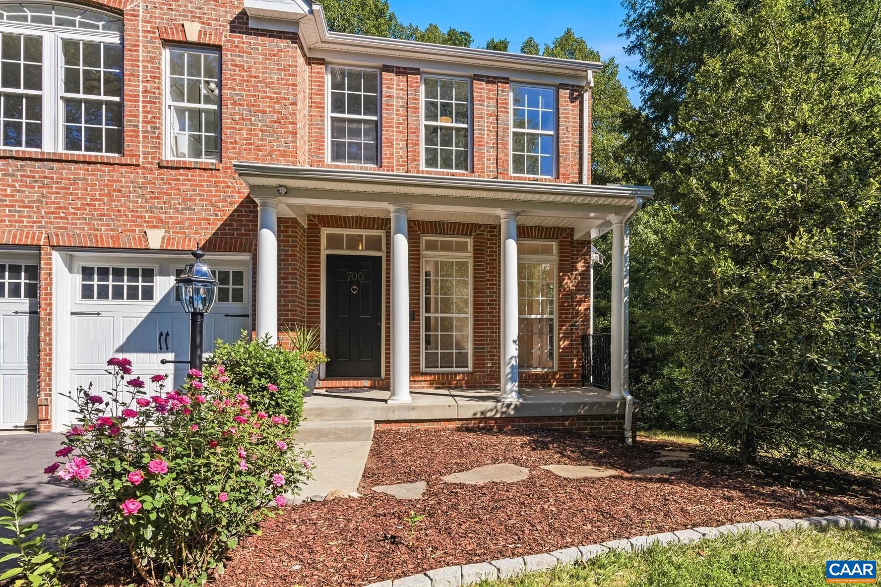 700 Rainier Road Charlottesville, VA 22903 - Photo 2 of 41 A closer look at the welcoming front porch with flowering landscape beds and shaded entry.
