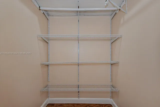 a view of an empty walk in closet