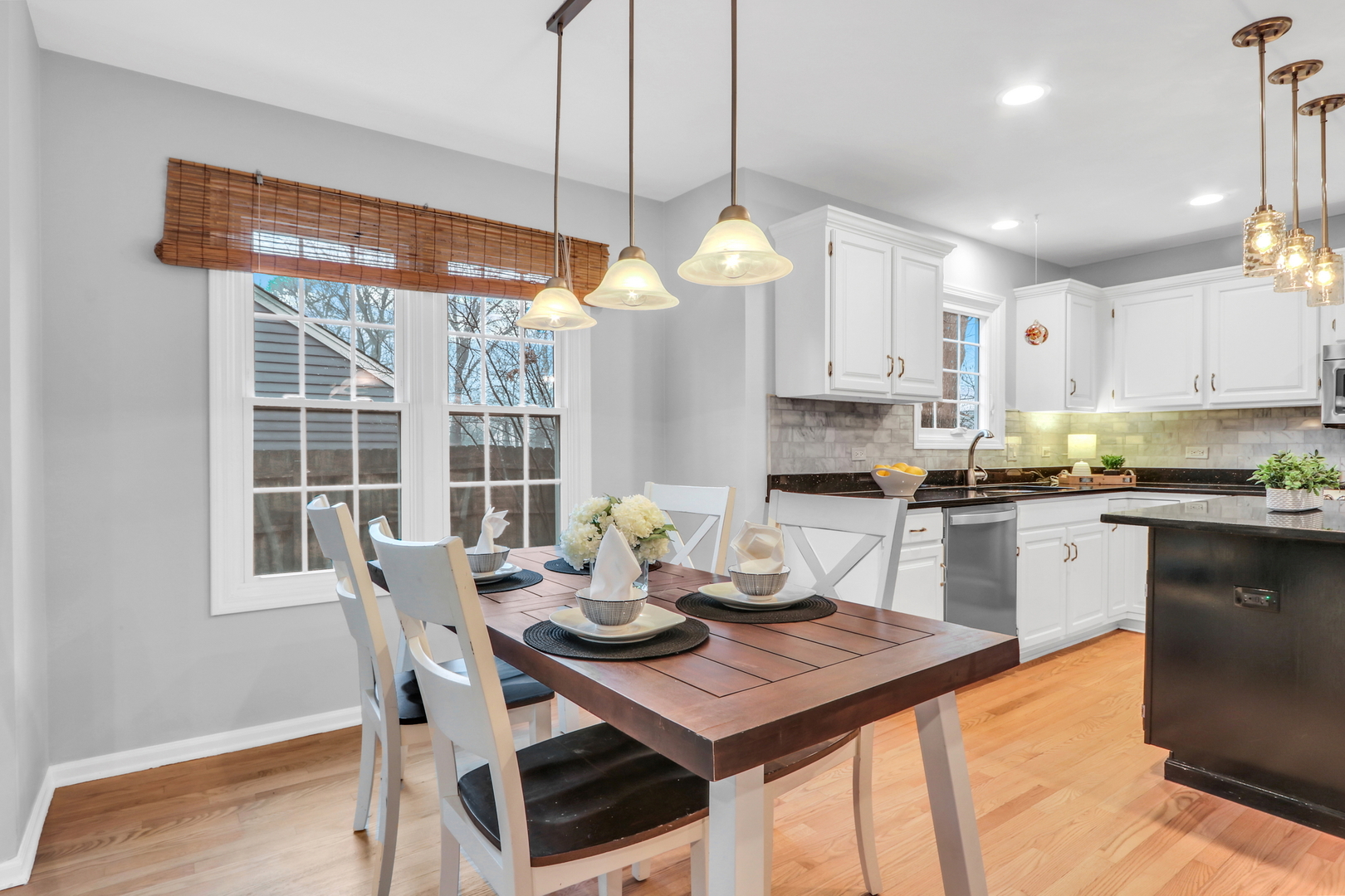 310 Concord Square Gurnee, IL 60031 - Photo 14 of 46 a kitchen with a table and chairs in it