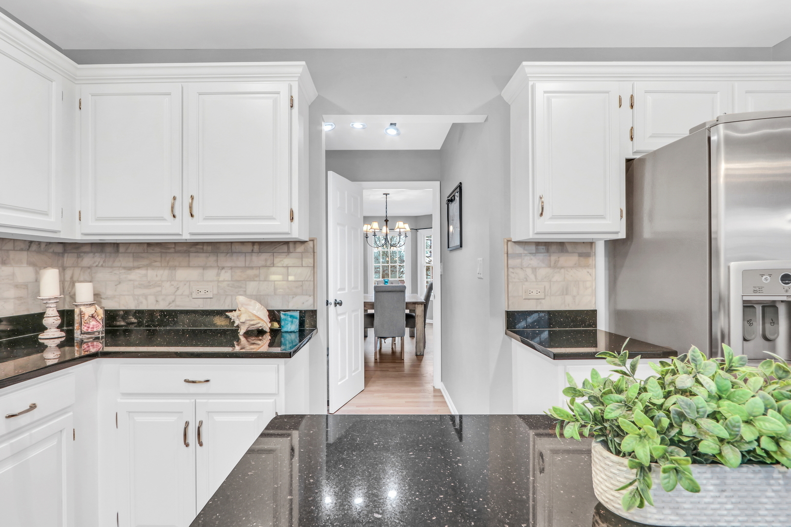 310 Concord Square Gurnee, IL 60031 - Photo 20 of 46 a kitchen with stainless steel appliances granite countertop a refrigerator sink and stove
