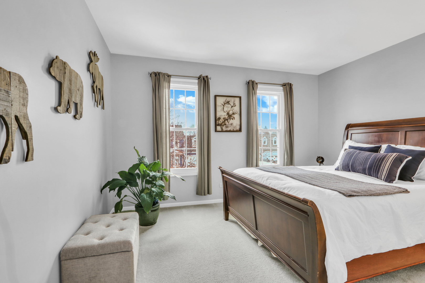 310 Concord Square Gurnee, IL 60031 - Photo 29 of 46 a bed sitting in a bedroom next to a window