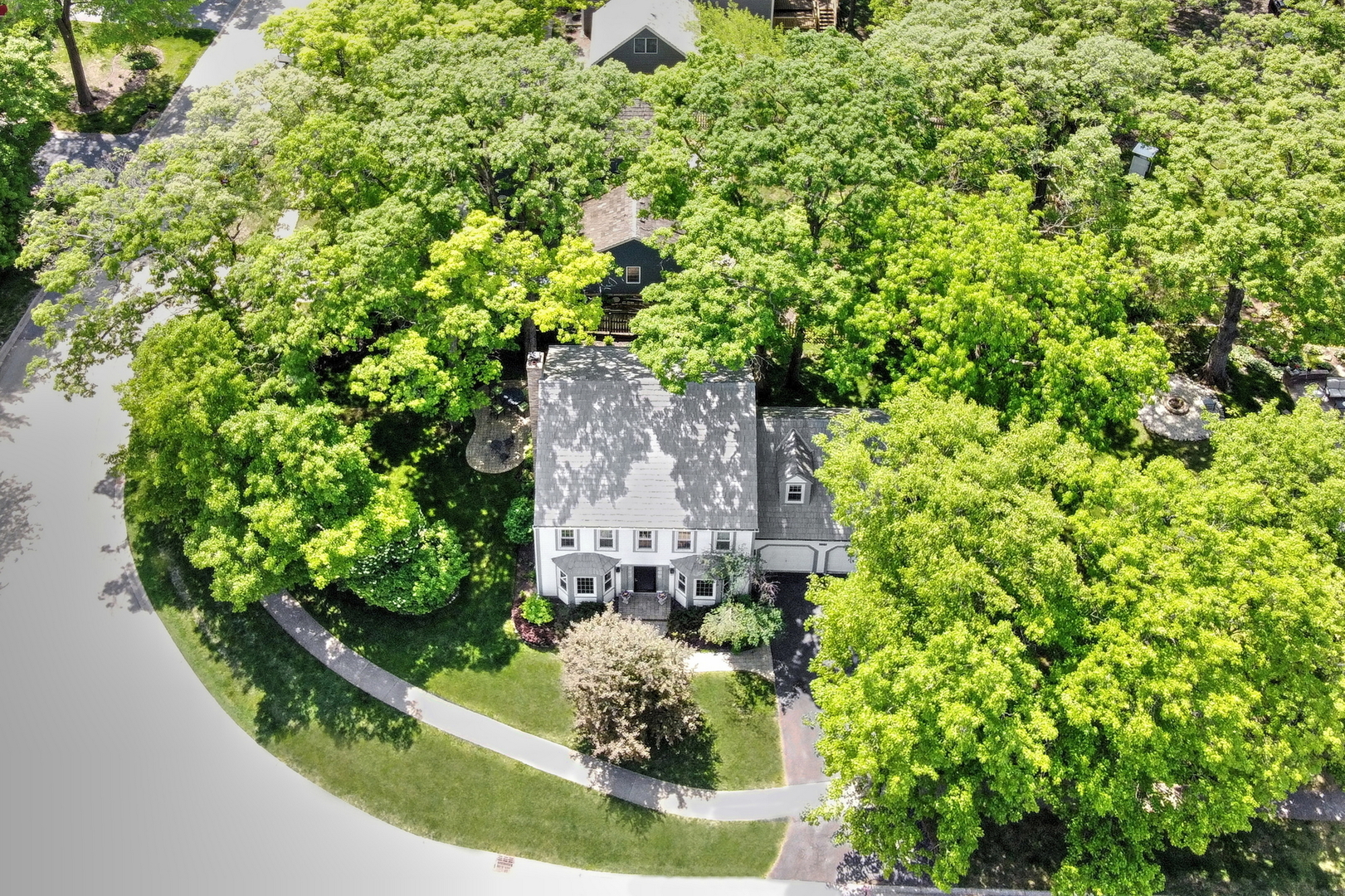 310 Concord Square Gurnee, IL 60031 - Photo 39 of 46 an aerial view of a house with a yard and garden