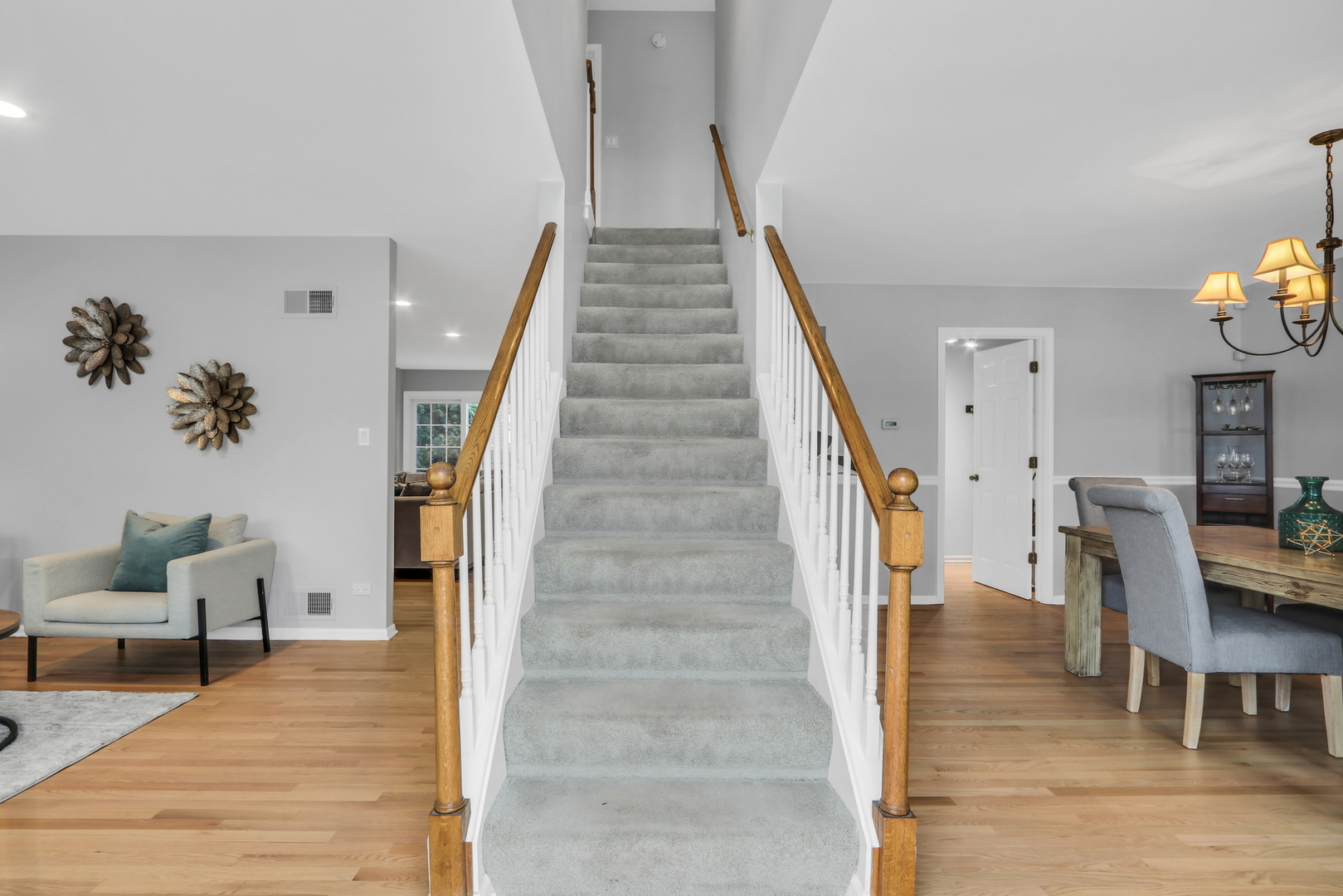310 Concord Square Gurnee, IL 60031 - Photo 9 of 46 a view of entryway and hall with wooden floor