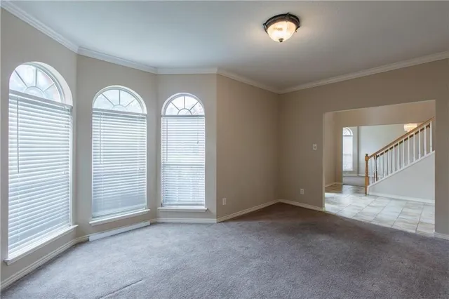 an empty room that has a window