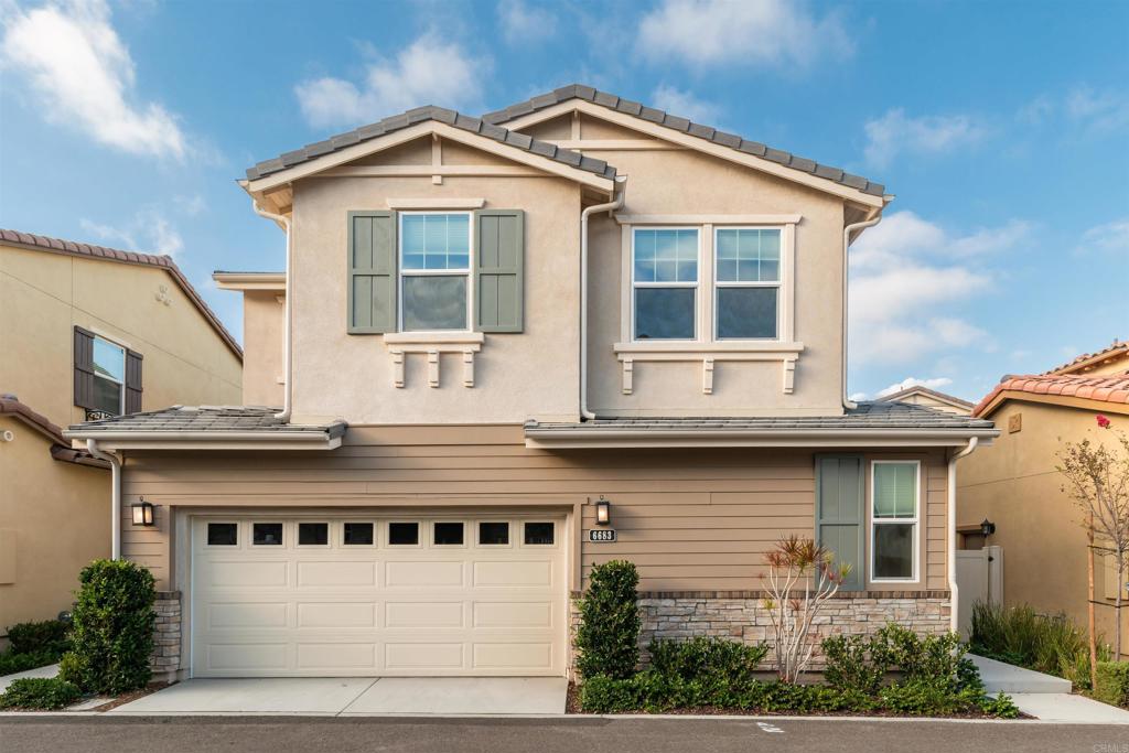 6683 Encelia Place Carlsbad, CA 92011 - Photo 1 of 10 a view of house and a yard with large windows