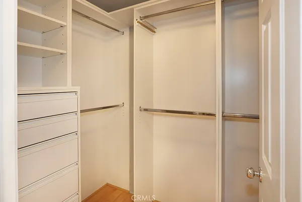 a bathroom with a shower and a mirror