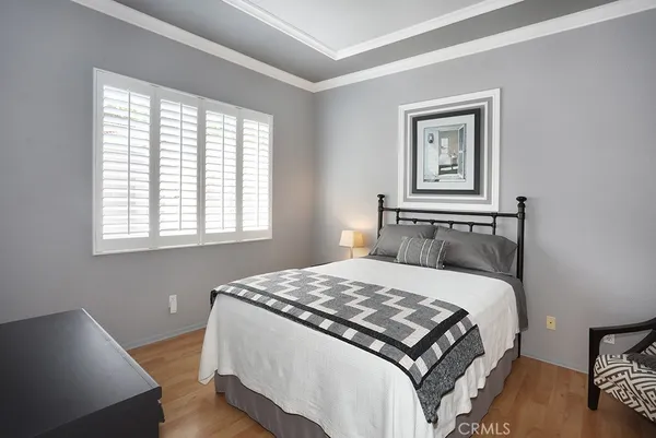 a kitchen with stainless steel appliances a stove microwave and sink