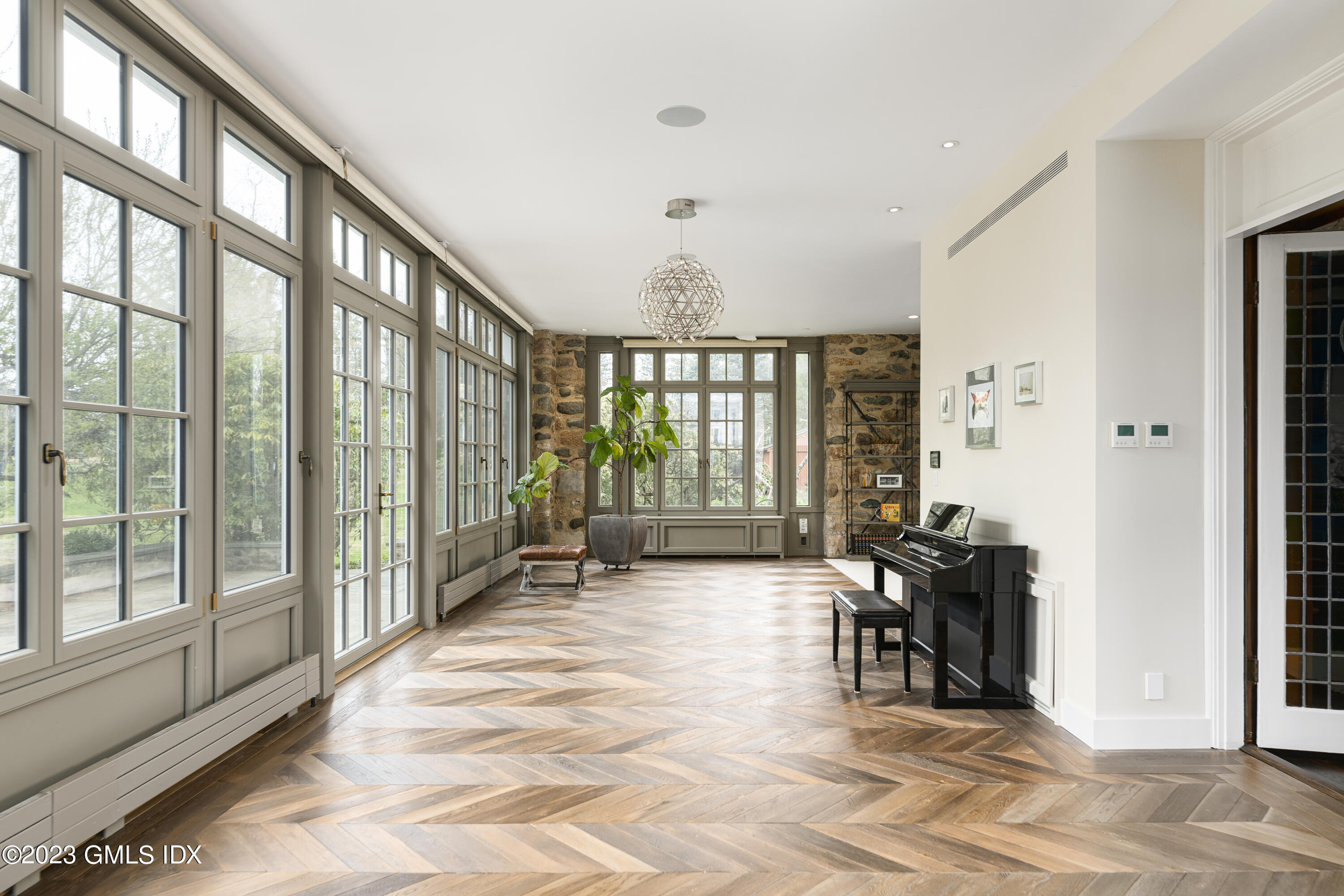 15 Upper Cross Road Greenwich, CT 06831 - Photo 18 of 39 a view of an entryway with a livingroom