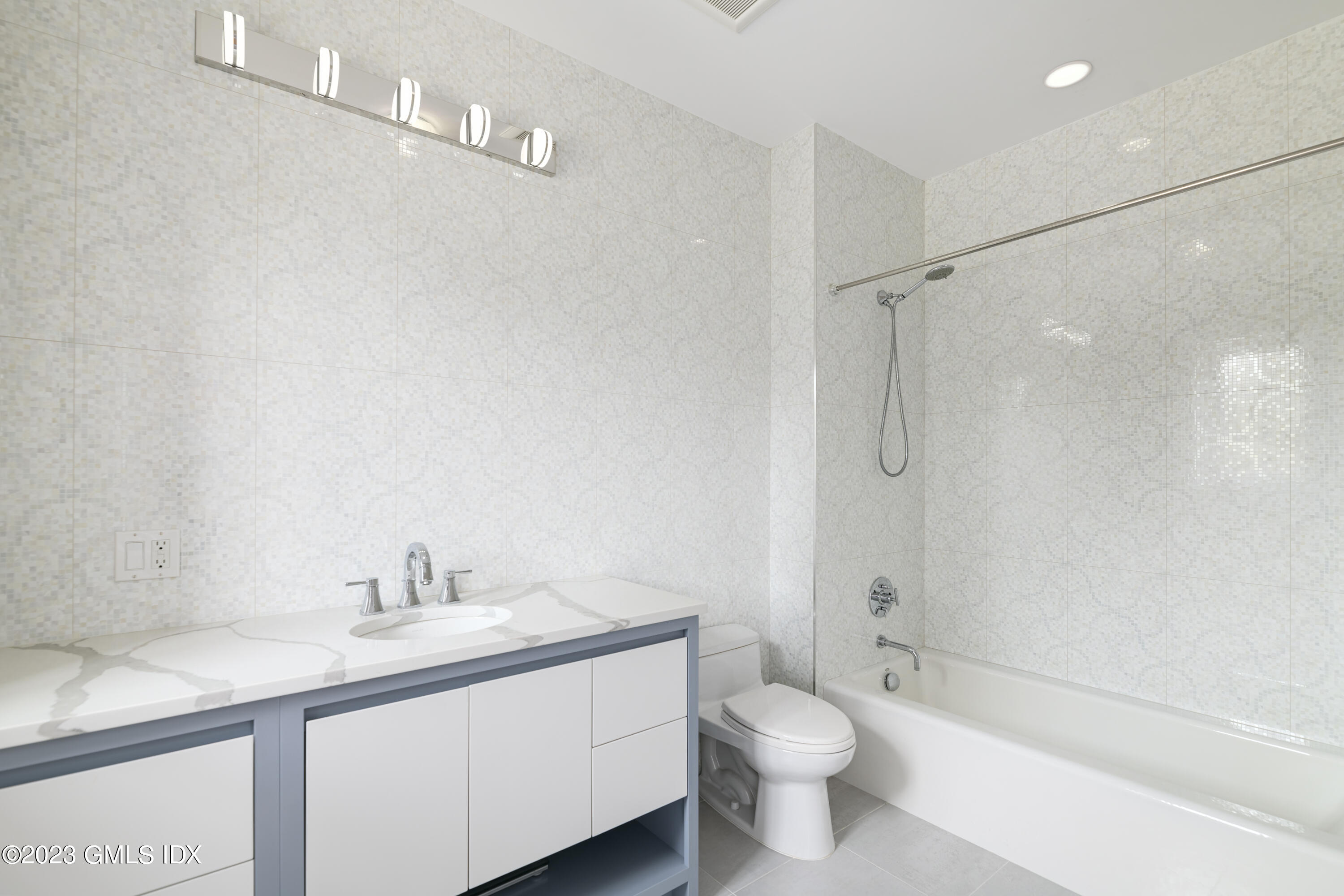 15 Upper Cross Road Greenwich, CT 06831 - Photo 28 of 39 a bathroom with a sink a toilet and shower