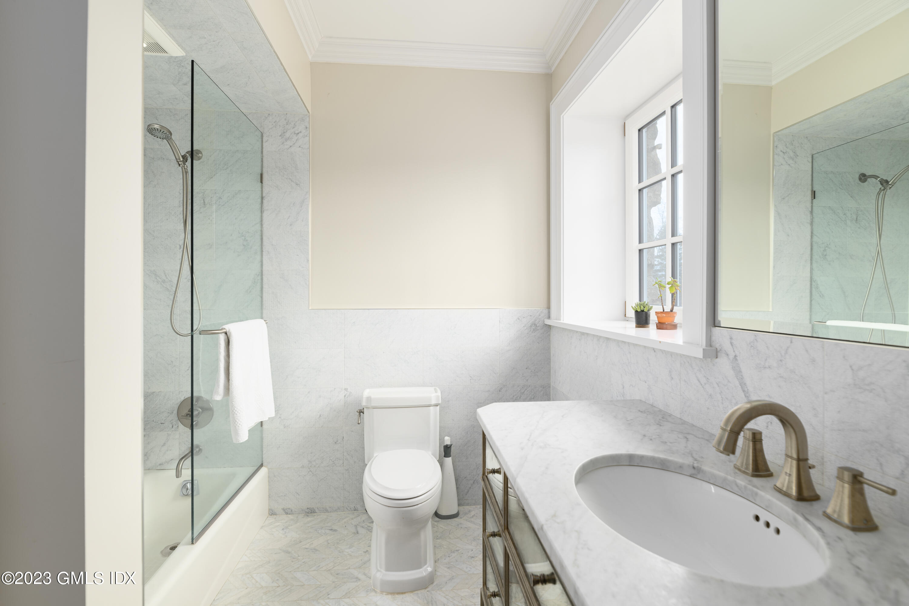 15 Upper Cross Road Greenwich, CT 06831 - Photo 30 of 39 a bathroom with a toilet sink and mirror