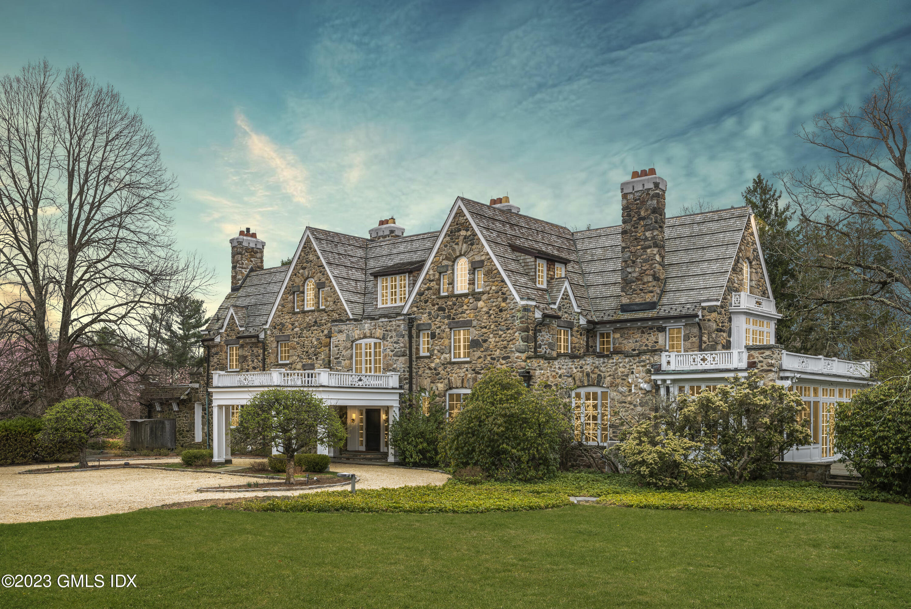 15 Upper Cross Road Greenwich, CT 06831 - Photo 39 of 39 a front view of a building with garden