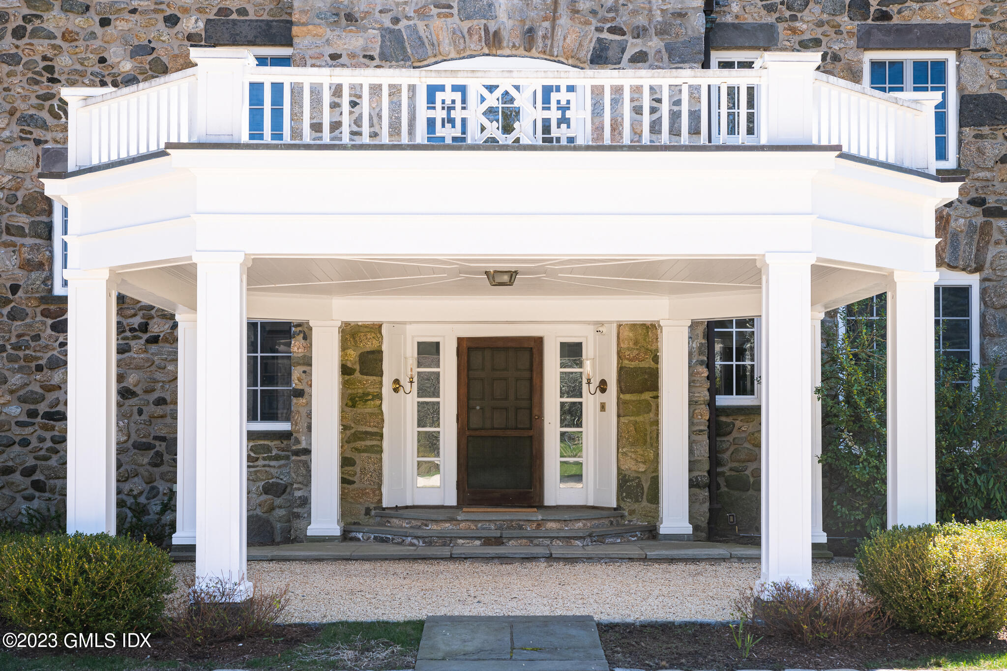 15 Upper Cross Road Greenwich, CT 06831 - Photo 5 of 39 a front view of a building