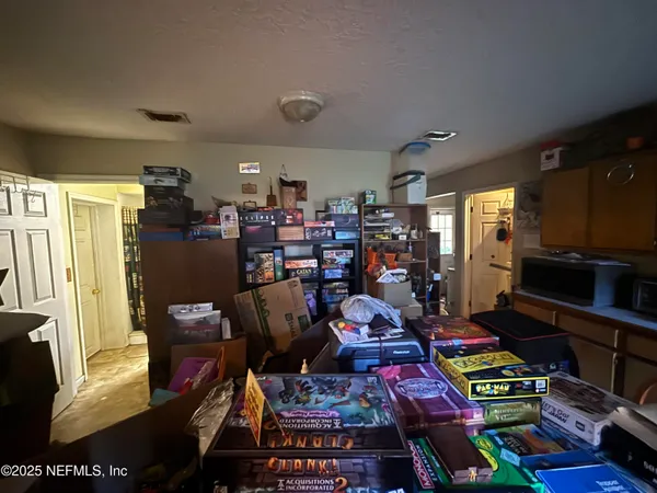 a view of a workspace with furniture