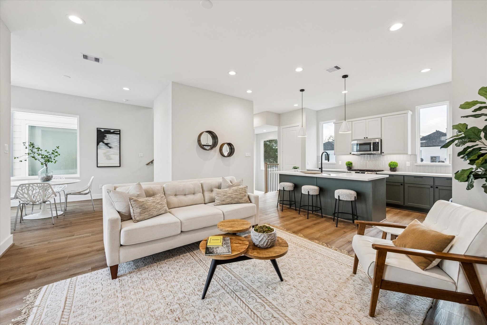 526 Janisch Road Houston, TX 77018 - Photo 12 of 34 a living room with furniture and kitchen view