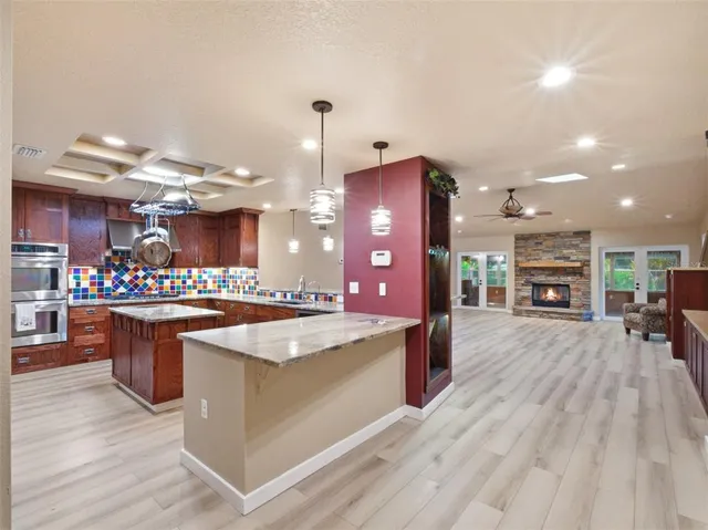 a fireplace with a clock on top of it