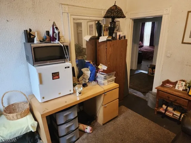 a white toilet sitting next to a bathroom sink
