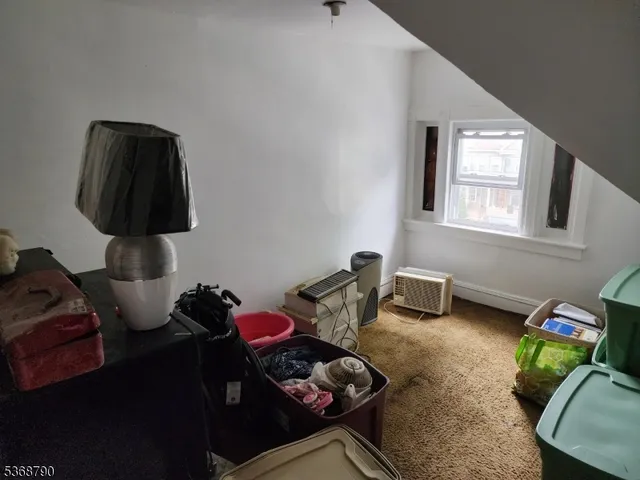 a view of a chairs and table in backyard of the house