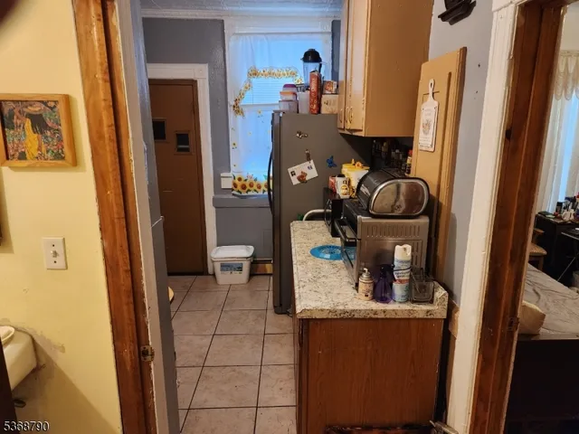 a bedroom with bed and a closet