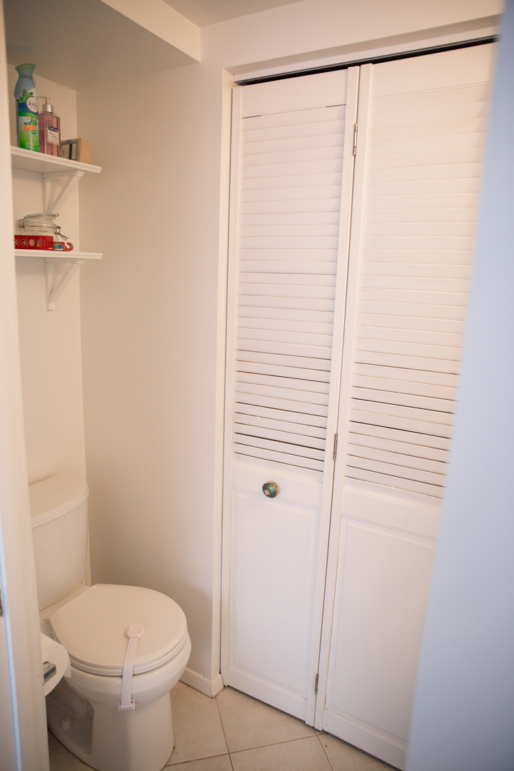 649 Spring Road Glenview, IL 60025 - Photo 13 of 16 a bathroom with a shower and a toilet