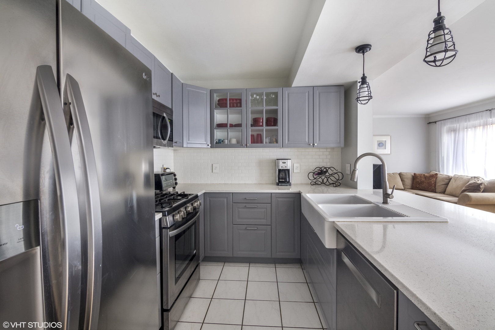 649 Spring Road Glenview, IL 60025 - Photo 6 of 16 a kitchen with a sink stainless steel appliances and cabinets