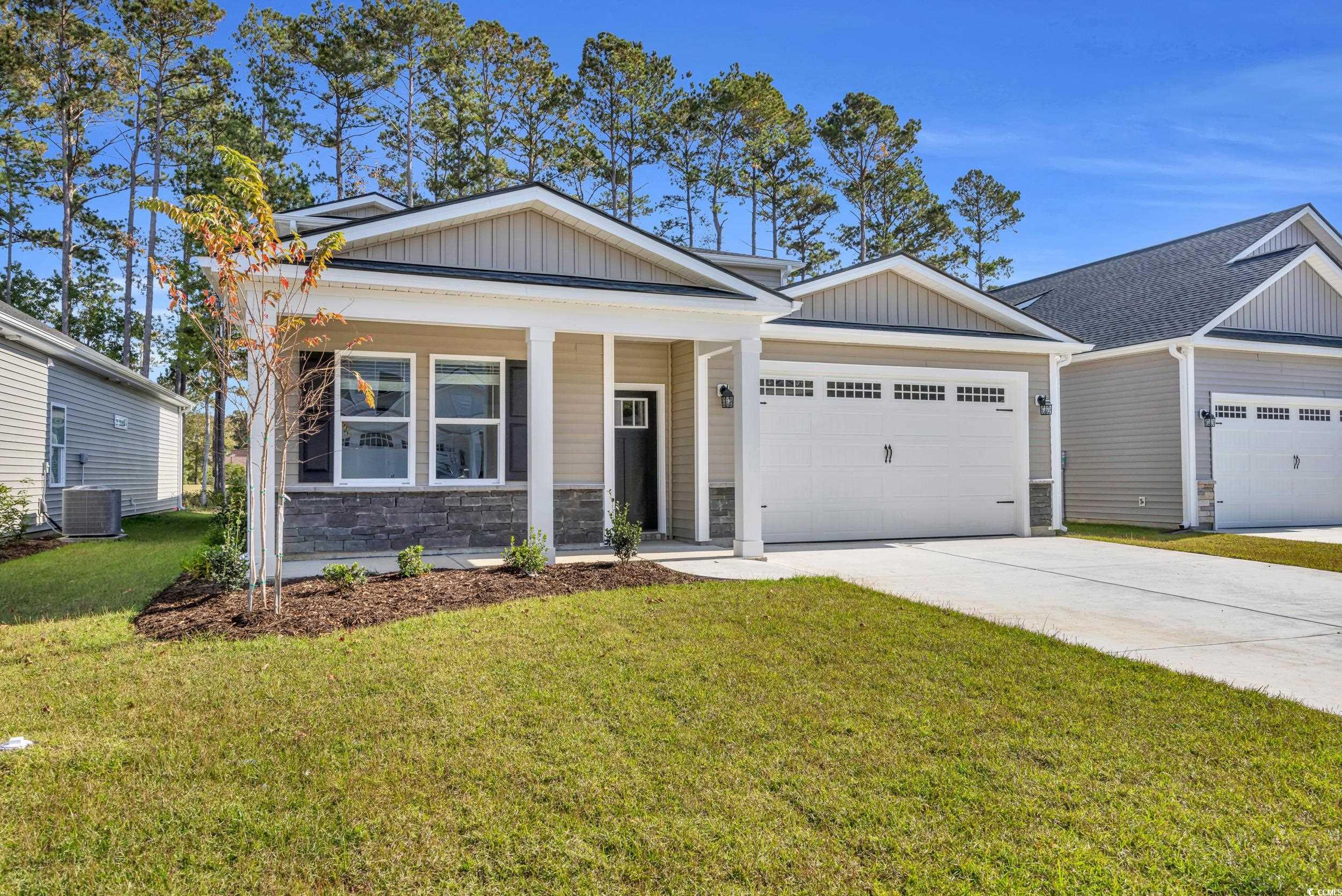 538 Beckham Court Murrells Inlet, SC 29576 - Photo 3 of 37 Craftsman house with a front yard, cooling unit, a