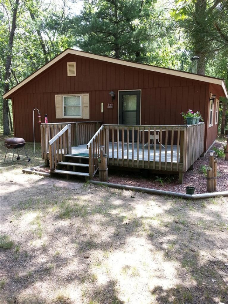 9012 South Woodcliff Road Baldwin, MI 49304 - Photo 1 of 17 Primary Photo