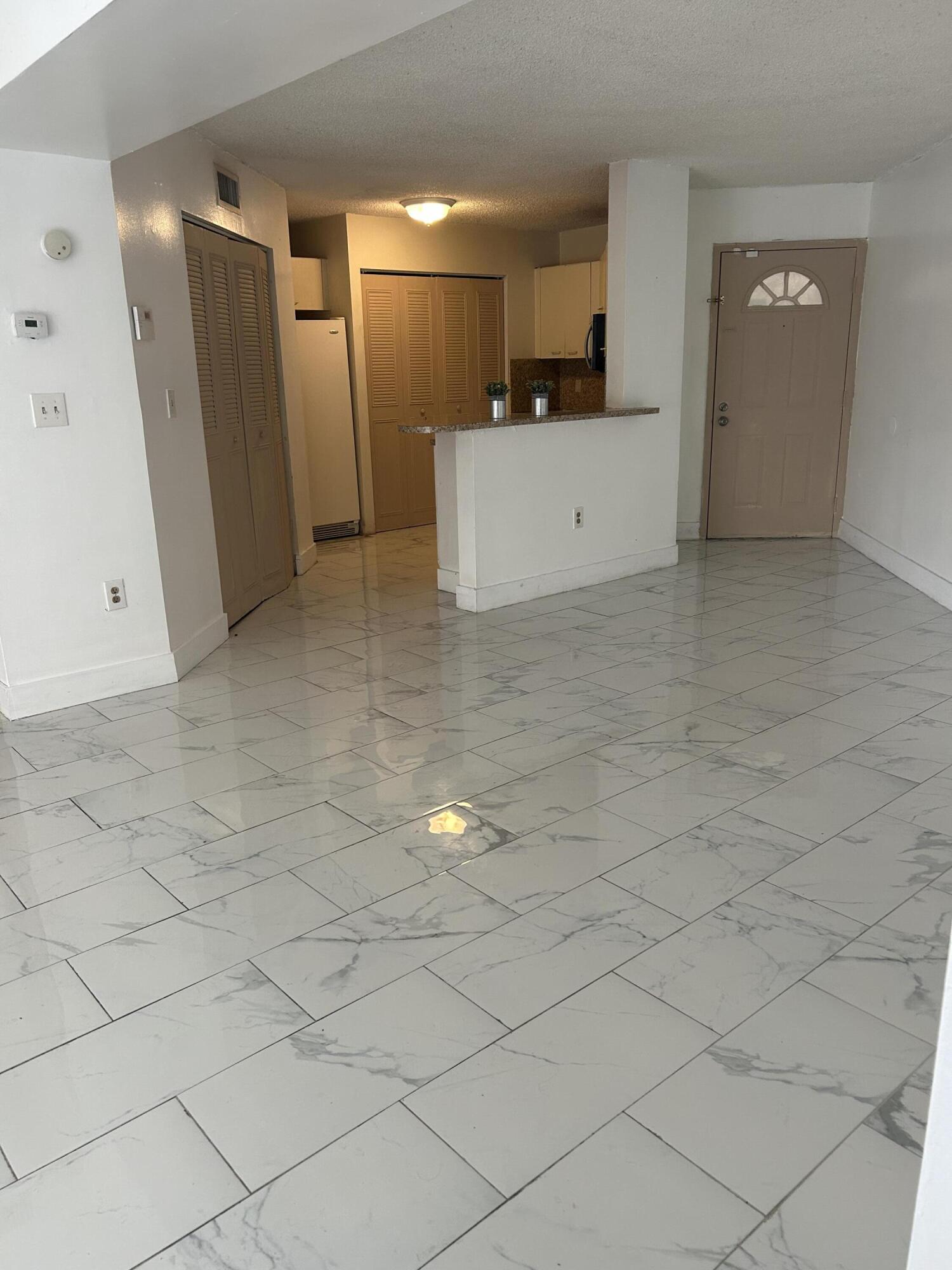 6296 Northwest 186th Street, Unit 210 Hialeah, FL 33015 - Photo 4 of 8 IMG_0048