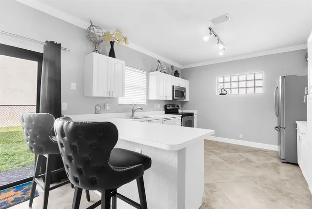 $605,000 | 11125 Northwest 34th Court, Coral Springs, FL 33065