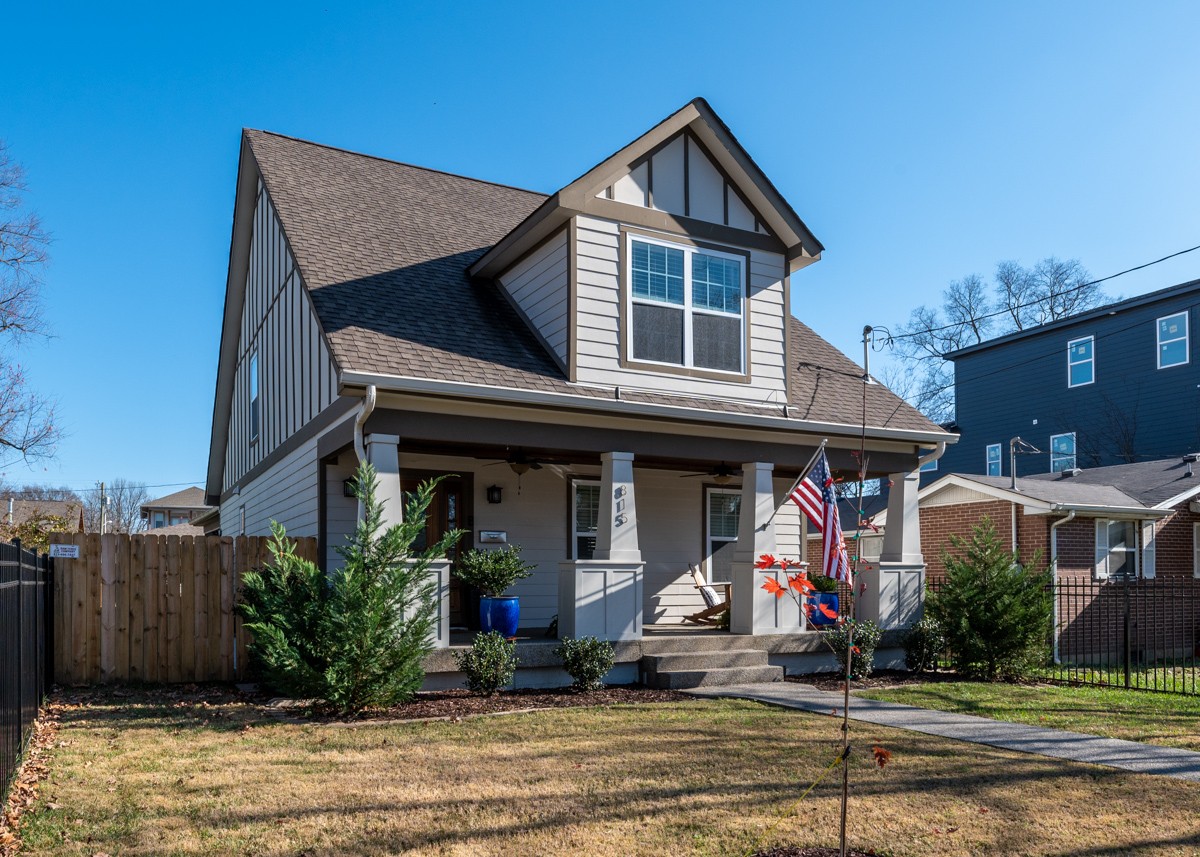 815 Lischey Avenue Nashville, TN 37207 - Photo 2 of 34 a front view of a house with a yard