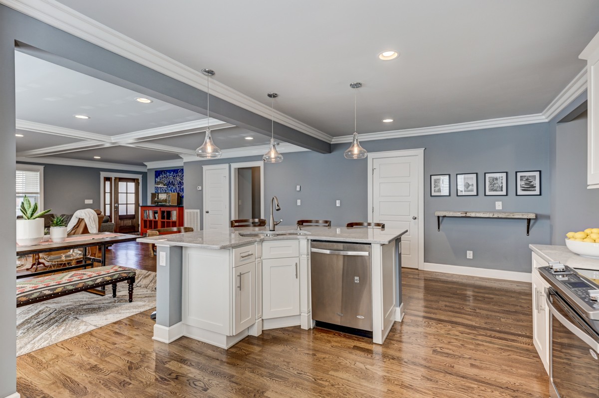 815 Lischey Avenue Nashville, TN 37207 - Photo 13 of 34 a kitchen with stainless steel appliances granite countertop a stove and a refrigerator