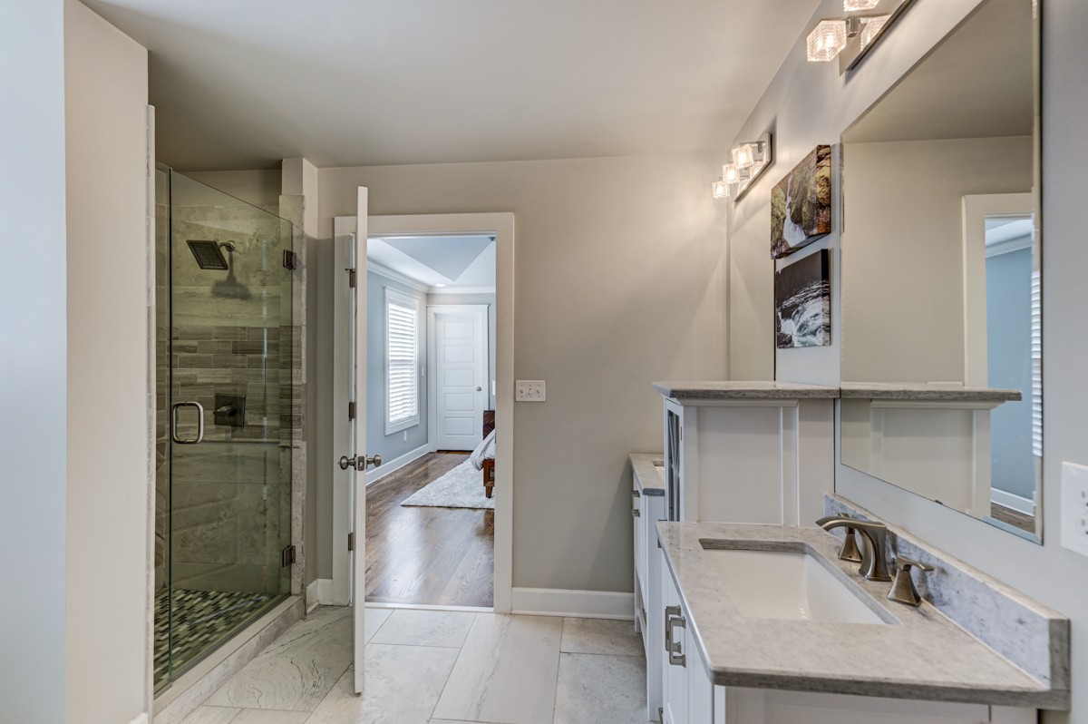 815 Lischey Avenue Nashville, TN 37207 - Photo 19 of 34 a bathroom with a sink and mirror