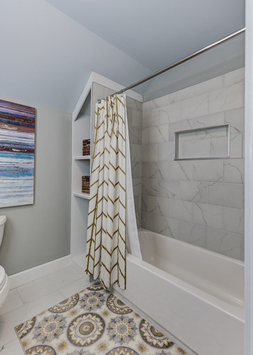 815 Lischey Avenue Nashville, TN 37207 - Photo 27 of 34 a bathroom with a bathtub and shower