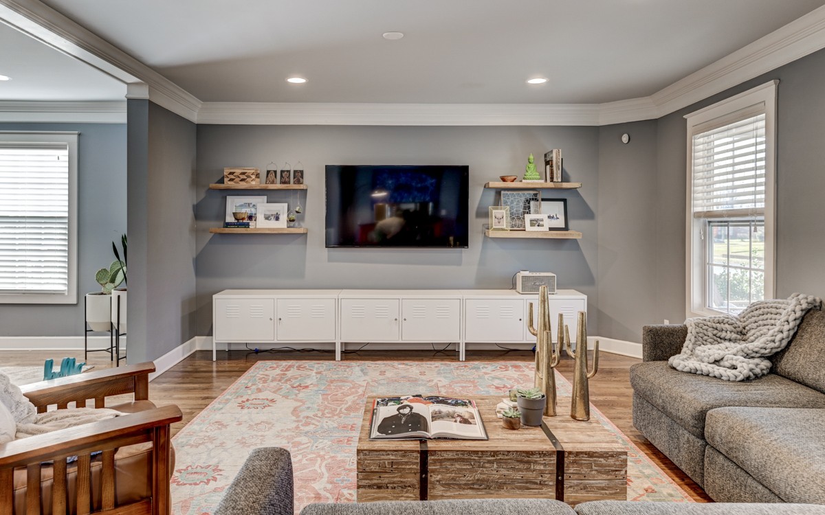 815 Lischey Avenue Nashville, TN 37207 - Photo 4 of 34 a living room with furniture and a flat screen tv